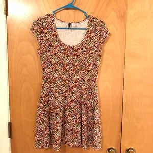 Mini floral print jersey scoop neck dress.
